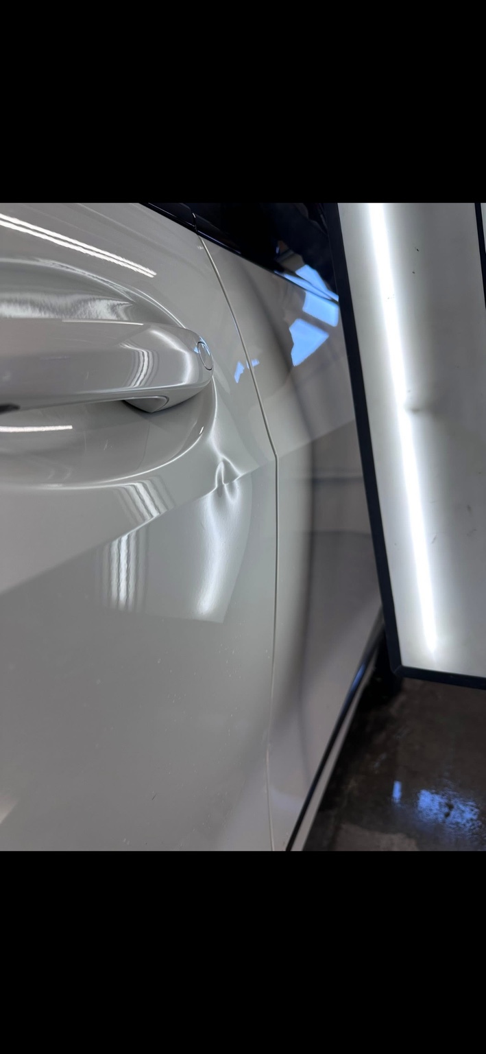 White vehicle PDR before