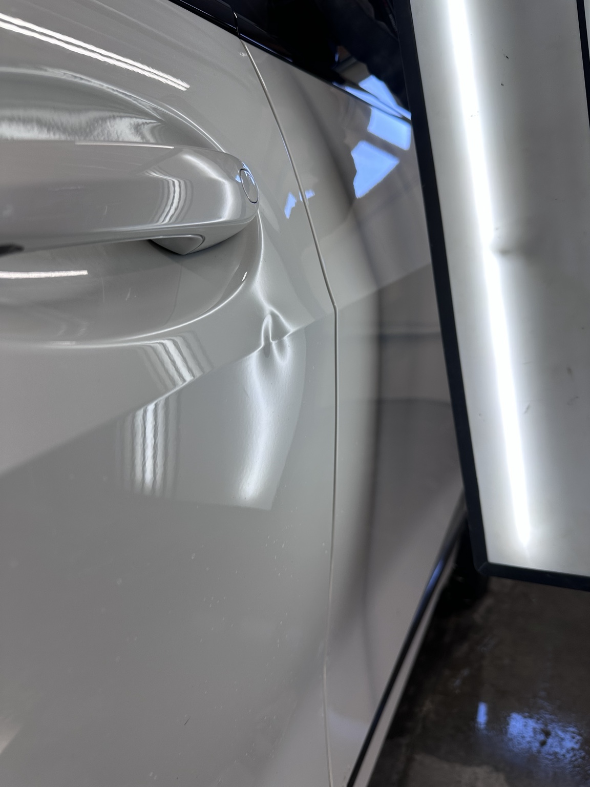 White vehicle PDR before